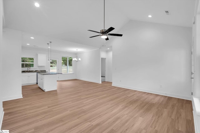 107A W Stewart St, Pelzer, SC 29669 - unfurnished living room with recessed lighting, a sink, a ceiling fan, light wood-type flooring, and baseboards