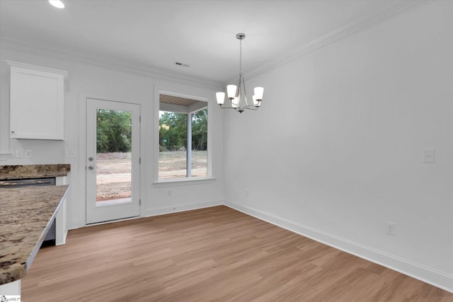 107A W Stewart St, Pelzer, SC 29669 - unfurnished dining area featuring a chandelier, light wood-style flooring, ornamental molding, and baseboards
