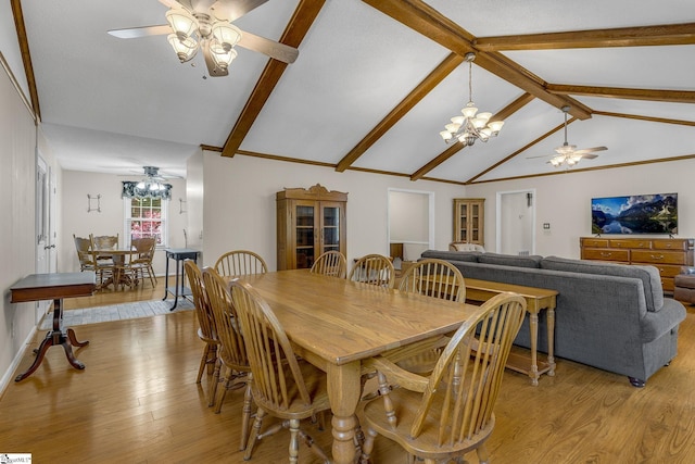 dining space with a chandelier, light wood-style floors, and ceiling fan