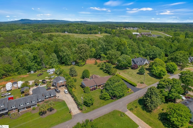 drone / aerial view of a heavily wooded area