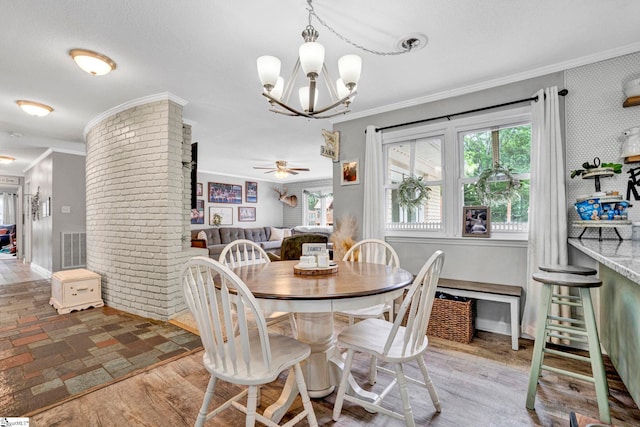 103 Mississippi Dr, Clinton, SC 29325 - dining area featuring ornamental molding, a chandelier, baseboards, and a ceiling fan