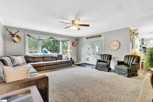 103 Mississippi Dr, Clinton, SC 29325 - living area featuring ornamental molding, a ceiling fan, brick wall, and a textured ceiling