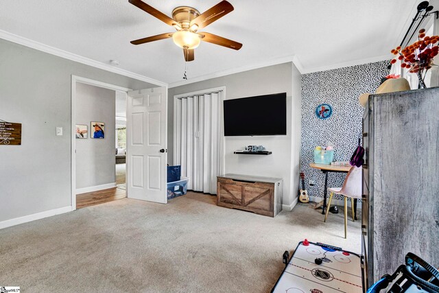 103 Mississippi Dr, Clinton, SC 29325 - playroom featuring ornamental molding, ceiling fan, carpet, and baseboards
