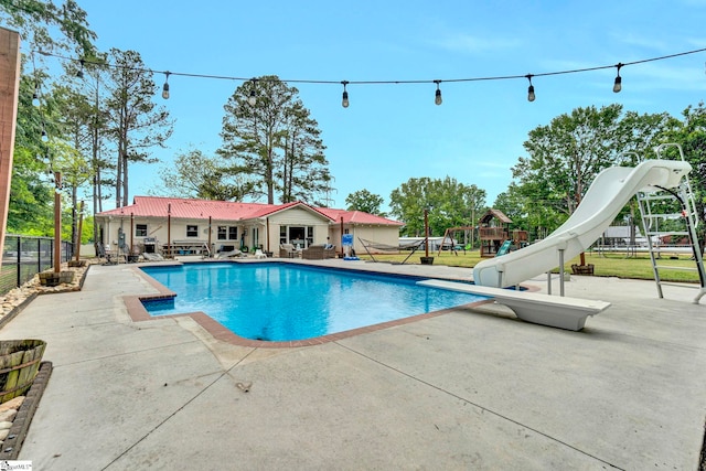 103 Mississippi Dr, Clinton, SC 29325 - view of pool with a water slide, a patio, fence, and a diving board