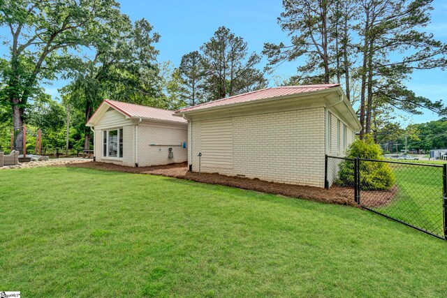 103 Mississippi Dr, Clinton, SC 29325 - back of property featuring brick siding and metal roof