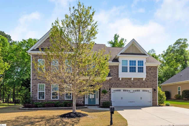101 Belgian Blue Way, Fountain Inn, SC 29644 - view of front facade featuring brick siding, driveway, and a garage