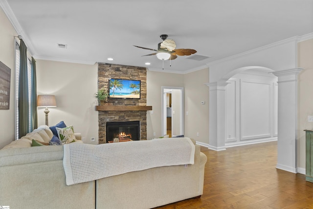 101 Belgian Blue Way, Fountain Inn, SC 29644 - living area featuring ceiling fan, arched walkways, hardwood / wood-style flooring, a stone fireplace, and ornate columns