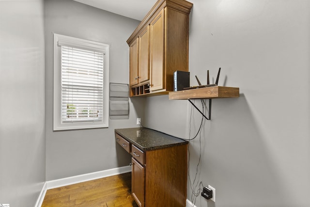 101 Belgian Blue Way, Fountain Inn, SC 29644 - laundry area featuring cabinet space, wood finished floors, and baseboards