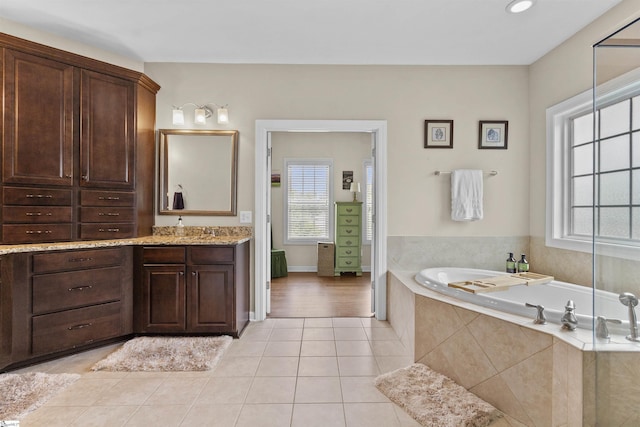 101 Belgian Blue Way, Fountain Inn, SC 29644 - bathroom featuring tile patterned flooring, a bath, vanity, and a shower with shower door