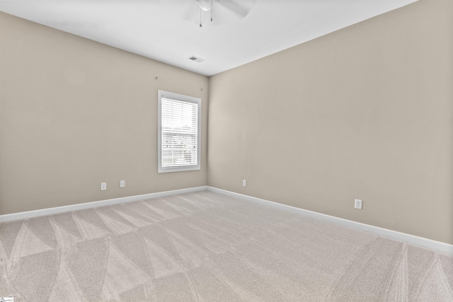 101 Belgian Blue Way, Fountain Inn, SC 29644 - spare room with ceiling fan, light carpet, and baseboards