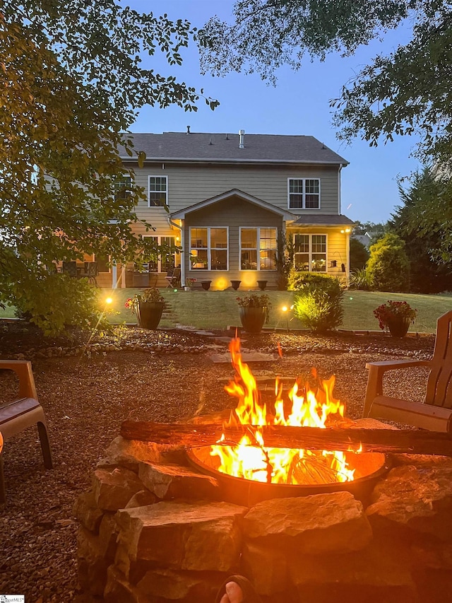 101 Belgian Blue Way, Fountain Inn, SC 29644 - rear view of house with an outdoor fire pit