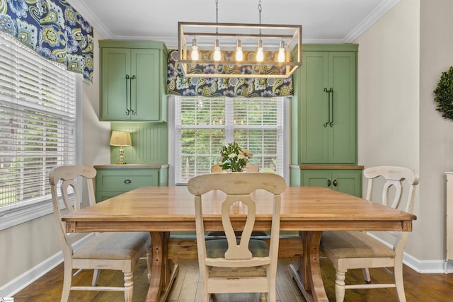 101 Belgian Blue Way, Fountain Inn, SC 29644 - dining area featuring baseboards, crown molding, healthy amount of natural light, and dark wood-type flooring