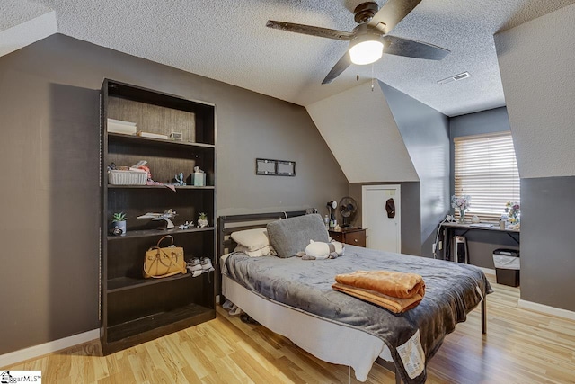 221 Twin Falls Dr, Simpsonville, SC 29680 - bedroom with a textured ceiling, wood finished floors, a ceiling fan, and baseboards