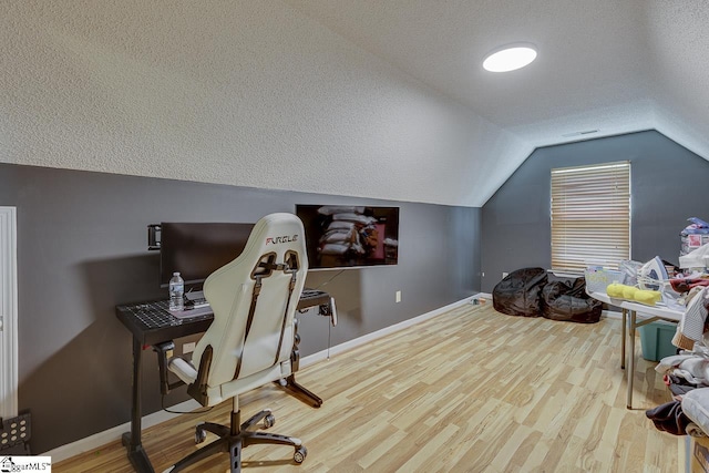 221 Twin Falls Dr, Simpsonville, SC 29680 - bonus room featuring lofted ceiling, wood finished floors, baseboards, and a textured ceiling