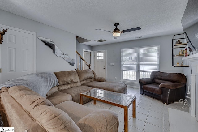 221 Twin Falls Dr, Simpsonville, SC 29680 - living area featuring a ceiling fan, light tile patterned flooring, a textured ceiling, and stairway