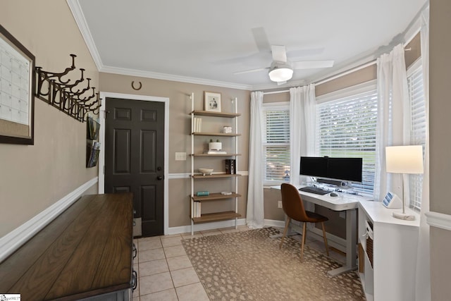 office with crown molding, ceiling fan, light tile patterned floors, and baseboards