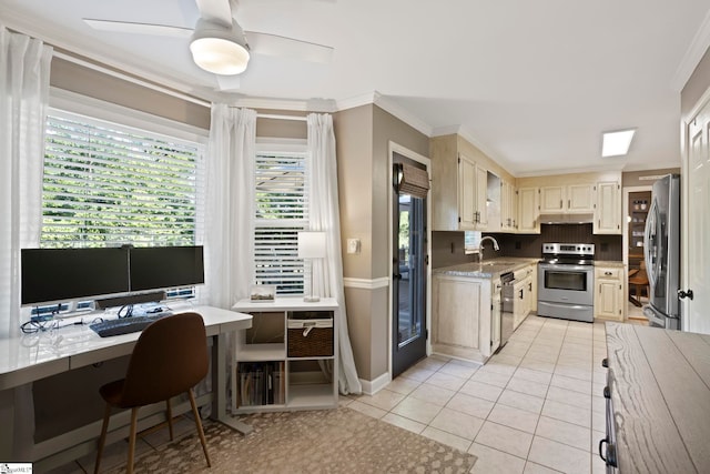 kitchen featuring stainless steel appliances, a sink, crown molding, under cabinet range hood, and light tile patterned flooring