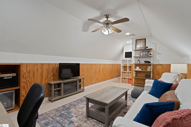 living room with lofted ceiling and a ceiling fan