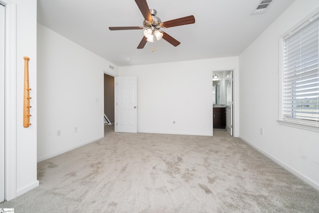 221 Wilsontown Rd, Laurens, SC 29360 - unfurnished bedroom with carpet floors, baseboards, and ensuite bath