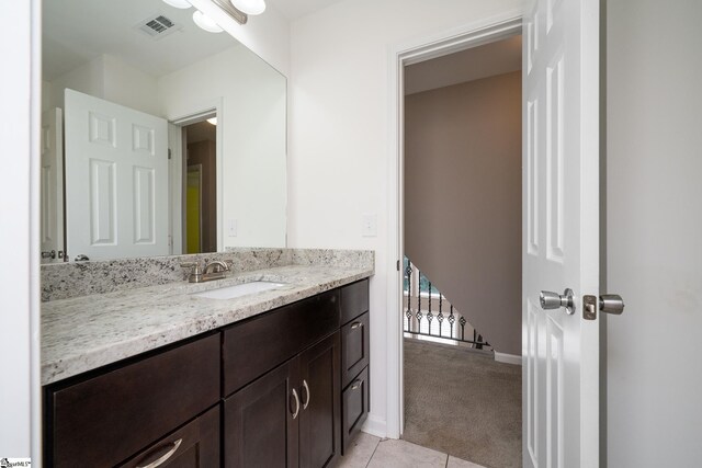 221 Wilsontown Rd, Laurens, SC 29360 - bathroom featuring tile patterned flooring, vanity, and baseboards