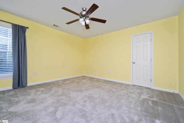 221 Wilsontown Rd, Laurens, SC 29360 - unfurnished room featuring a ceiling fan, carpet flooring, and baseboards