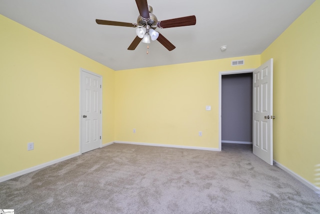 221 Wilsontown Rd, Laurens, SC 29360 - empty room with carpet flooring, a ceiling fan, baseboards, and a smoke detector