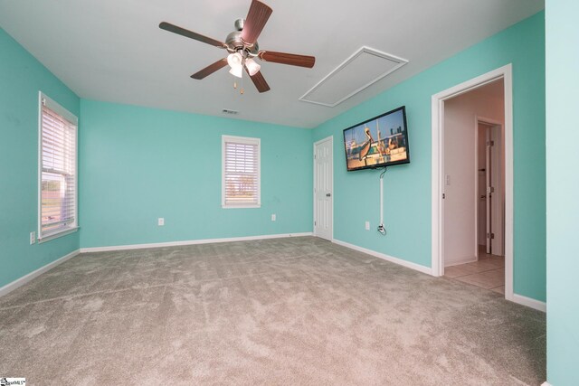221 Wilsontown Rd, Laurens, SC 29360 - carpeted empty room featuring attic access, ceiling fan, and baseboards