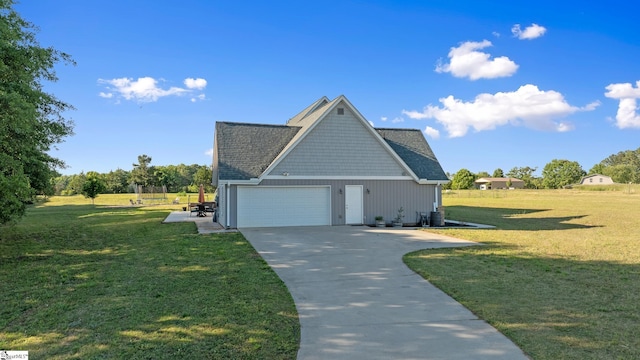 221 Wilsontown Rd, Laurens, SC 29360 - view of property exterior featuring a yard, driveway, and an attached garage