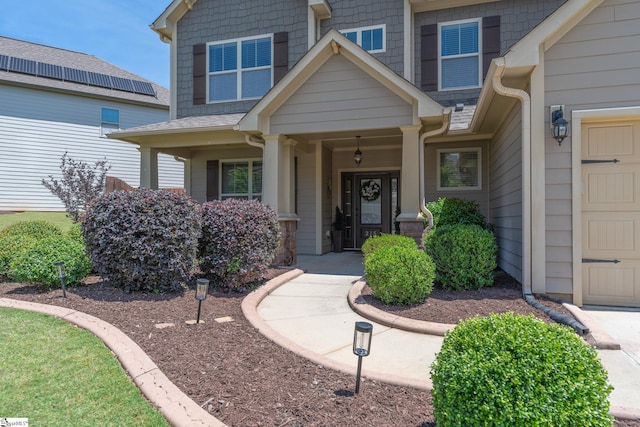 doorway to property with a porch
