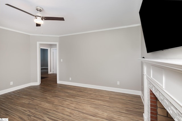 unfurnished living room featuring ceiling fan, baseboards, ornamental molding, and wood finished floors