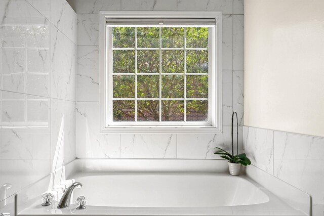 bathroom featuring a garden tub