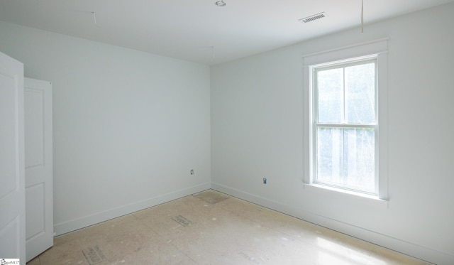empty room with baseboards