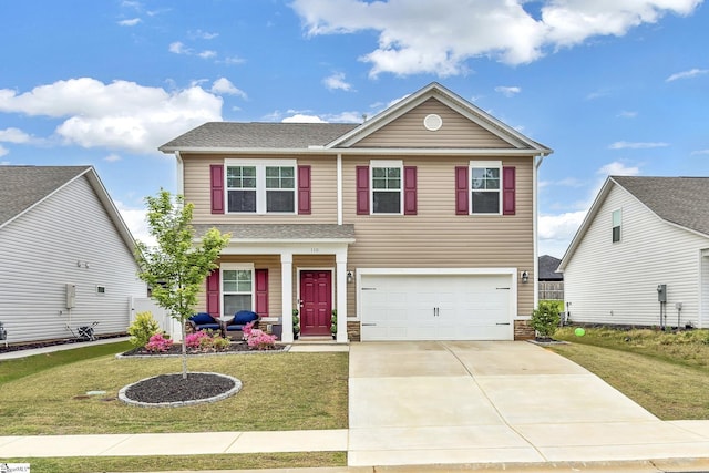110 Strongridge Trl, Simpsonville, SC 29681 - view of front of home with a porch, a front yard, driveway, and an attached garage