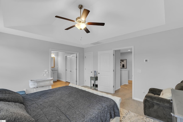 110 Strongridge Trl, Simpsonville, SC 29681 - bedroom with baseboards, a ceiling fan, a raised ceiling, and ensuite bathroom