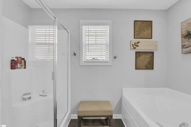 110 Strongridge Trl, Simpsonville, SC 29681 - bathroom with a shower stall, a bath, and baseboards
