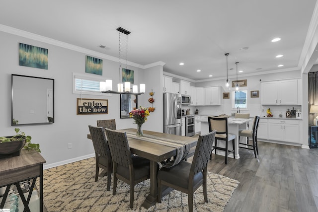 110 Strongridge Trl, Simpsonville, SC 29681 - dining space with recessed lighting, a chandelier, crown molding, baseboards, and wood finished floors
