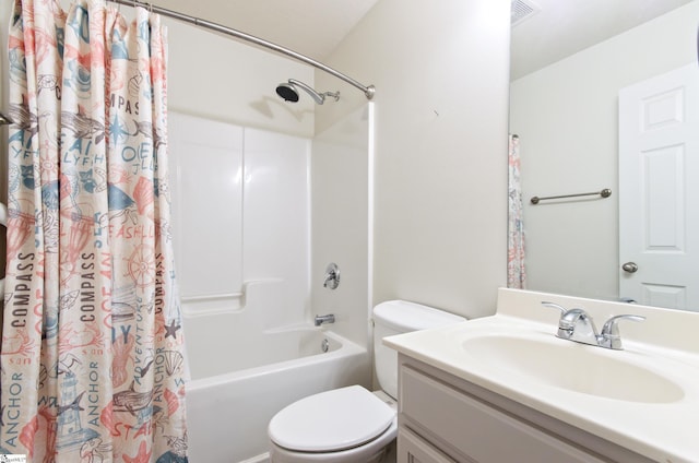 full bathroom with toilet, vanity, and shower / tub combo