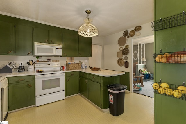 kitchen with white appliances, green cabinetry, a peninsula, and light countertops