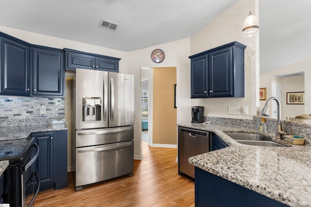 108 Shea Ct, Simpsonville, SC 29681 - kitchen featuring appliances with stainless steel finishes, a sink, blue cabinets, and light stone countertops