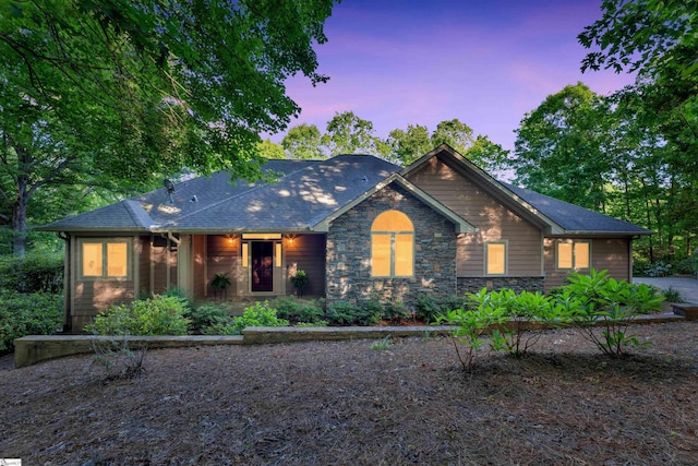 view of front of home featuring stone siding