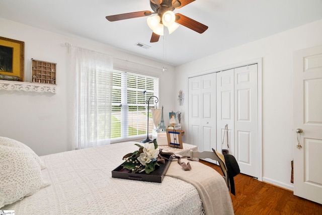 111 Woodvale Ave, Fountain Inn, SC 29644 - bedroom featuring wood finished floors, a closet, and ceiling fan