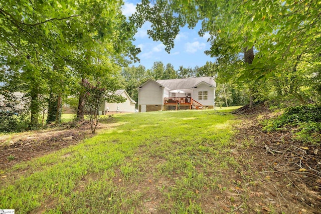 111 Woodvale Ave, Fountain Inn, SC 29644 - view of grassy yard featuring a deck