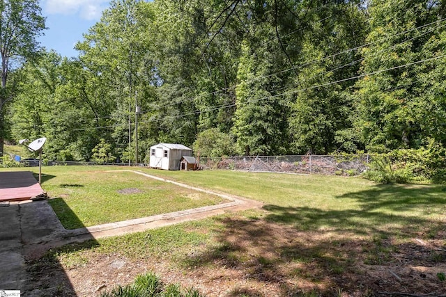 202 Forest Dr, Liberty, SC 29657 - view of yard with a storage unit and an outbuilding