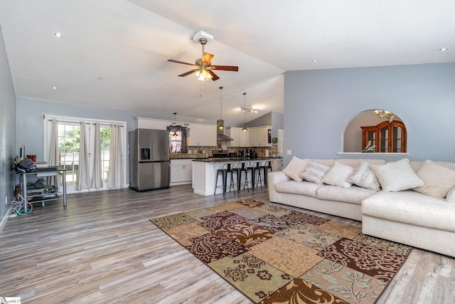 202 Forest Dr, Liberty, SC 29657 - living room with lofted ceiling, a ceiling fan, and wood finished floors