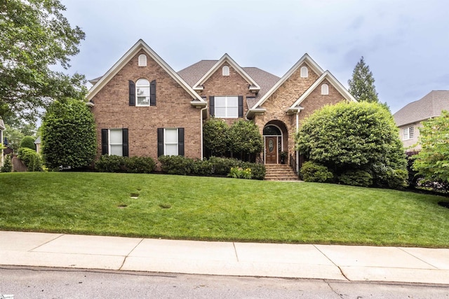 5 Marlis Ct, Greer, SC 29650 - traditional-style home with a front yard and brick siding