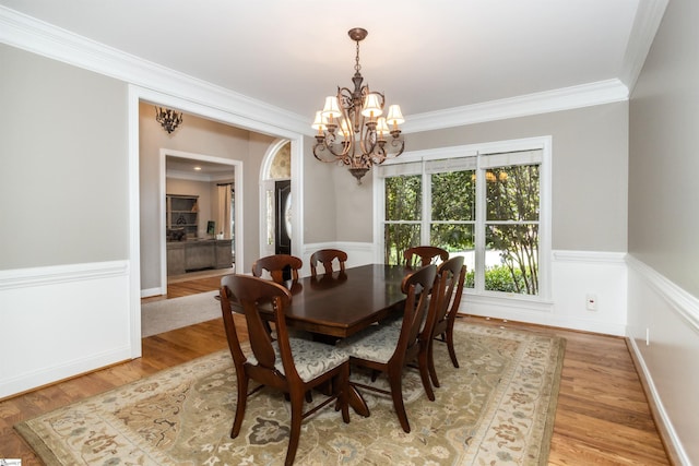 5 Marlis Ct, Greer, SC 29650 - dining space featuring a chandelier, ornamental molding, light wood-type flooring, and baseboards