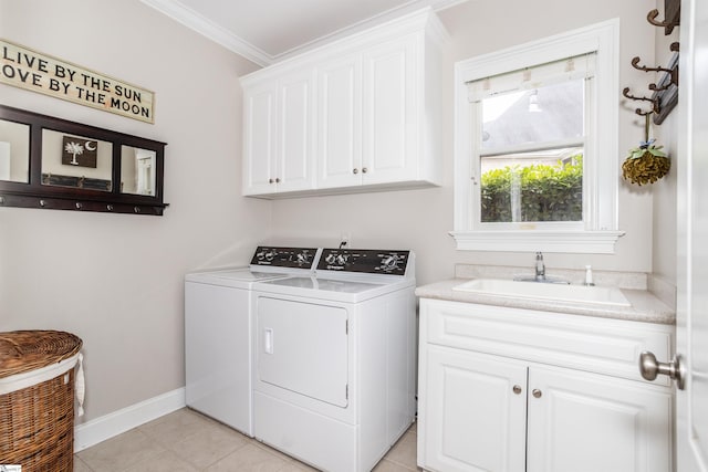 5 Marlis Ct, Greer, SC 29650 - laundry area with washing machine and dryer, cabinet space, ornamental molding, light tile patterned floors, and baseboards