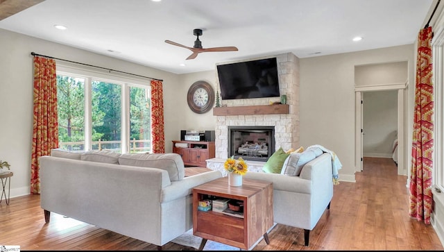 475 Johnson Rd, Easley, SC 29642 - living room with a ceiling fan, wood finished floors, a fireplace, baseboards, and recessed lighting