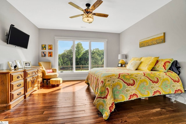 475 Johnson Rd, Easley, SC 29642 - bedroom with wood-type flooring, a ceiling fan, and baseboards