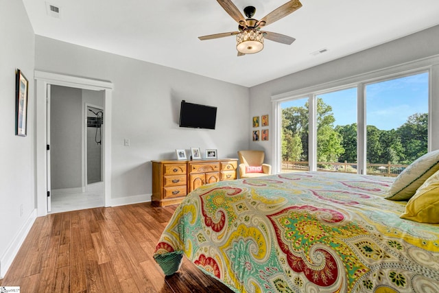 475 Johnson Rd, Easley, SC 29642 - bedroom featuring baseboards, wood finished floors, and a ceiling fan